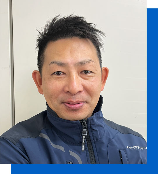 通信システム部 課長:金近 大樹